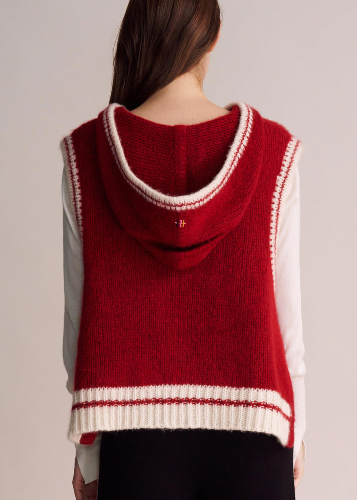 Close-up of luxury cashmere knit texture – hoodie vest with scarf