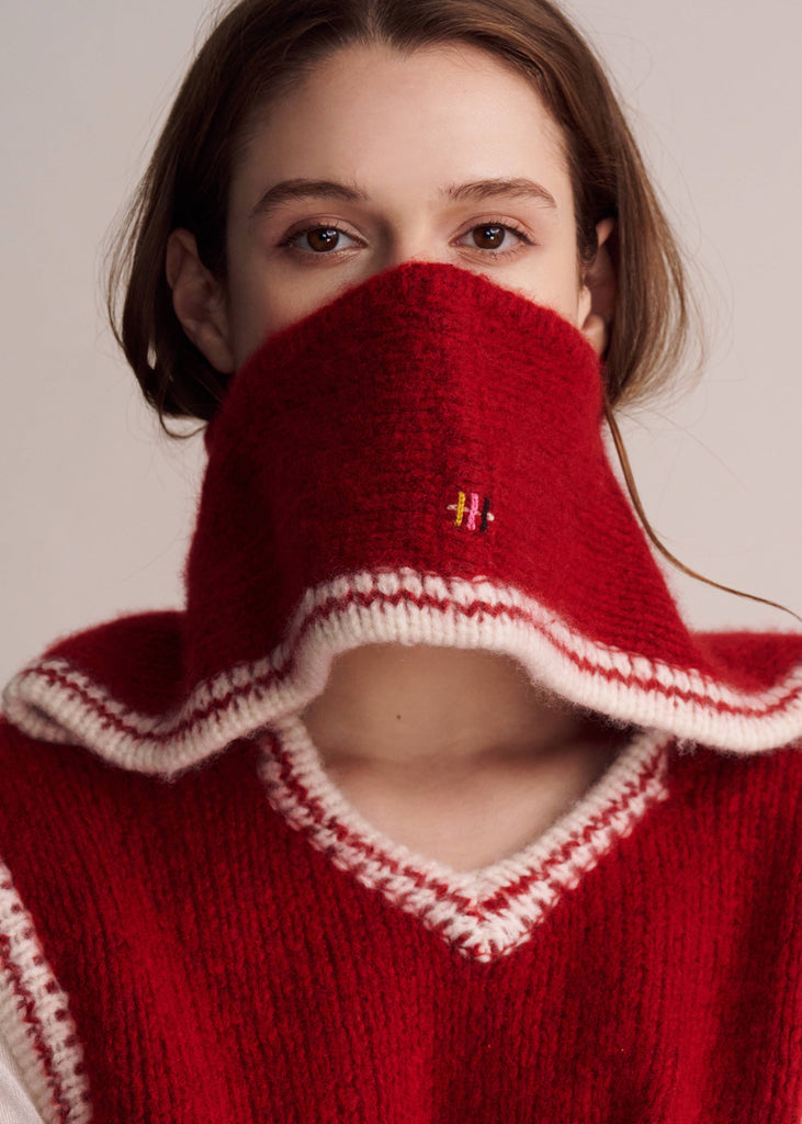 Close-up of luxury cashmere knit texture – hoodie vest with scarf